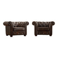 Fauteuil Chesterfield capitonné à accoudoirs volutes