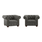 Fauteuil Chesterfield capitonné à accoudoirs volutes