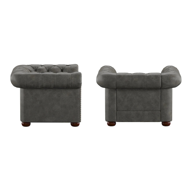Fauteuil Chesterfield capitonné à accoudoirs volutes