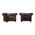 Fauteuil Chesterfield capitonné à accoudoirs volutes
