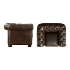 Fauteuil Chesterfield capitonné à accoudoirs volutes
